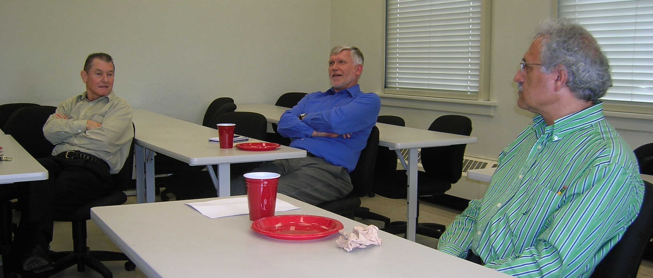 Audience members George Poole (Honors Linear Algebra instructor), Ivars Peterson, and Rafie Baghozian